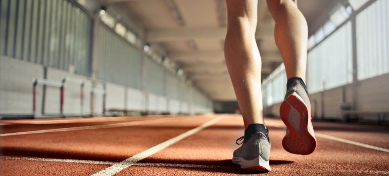 person running on the track