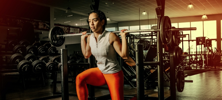 A woman working out in the gym.