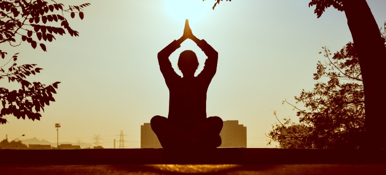 A person practicing yoga.