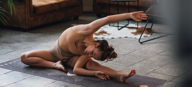 A woman doing effective home workouts for a balanced life.