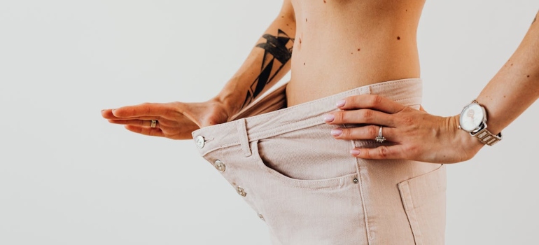 A woman with loose pants