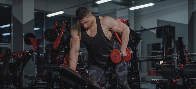 A man lifting dumbbells