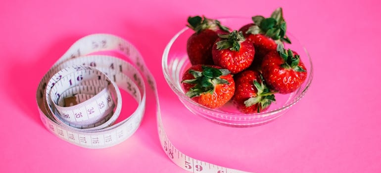 strawberries and a measuring tape