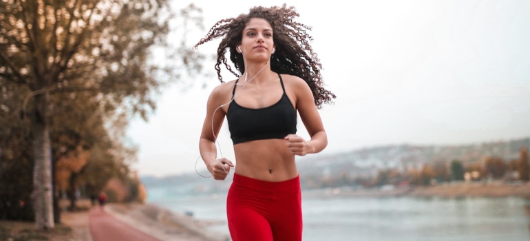a girl running on the beach