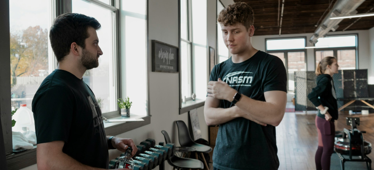 People talking in the gym