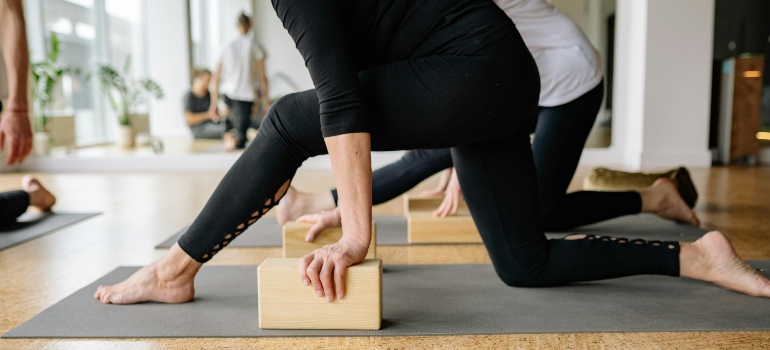 Elderly Women Exercising at Yoga Classes