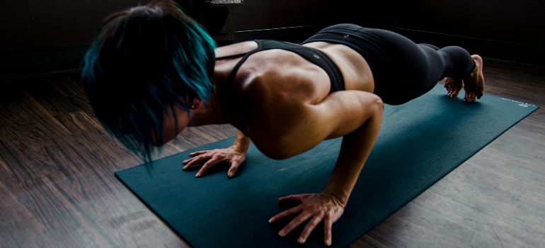 Person holding plank with proper form for strength training.