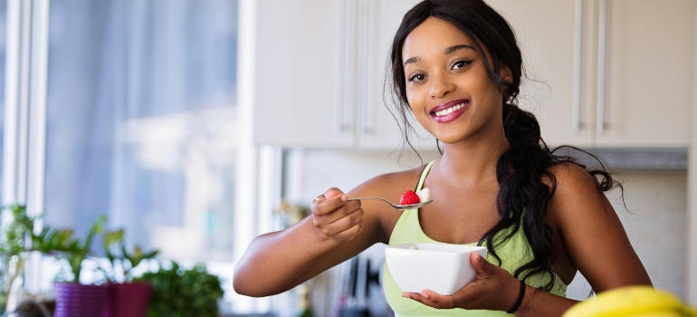 Smiling Woman Eating Healthy