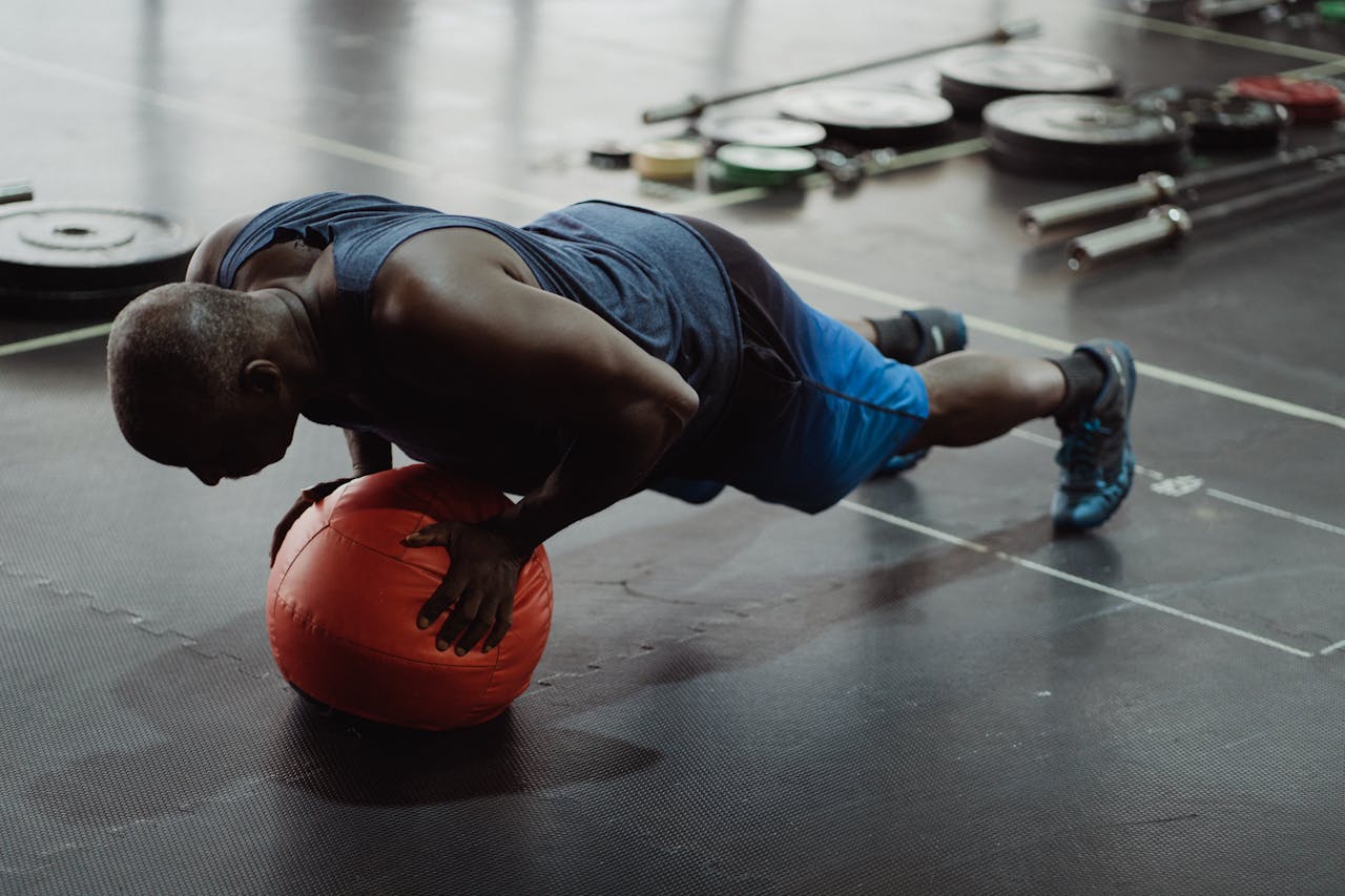 A man doing push ups and attending strength training bootcamps in Umm Al Quwain
